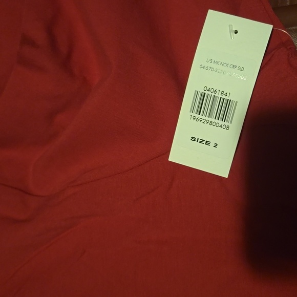 New mock neck long sleeve stretchy crop top color fuschia pink size 2=18/20. - Picture 4 of 4